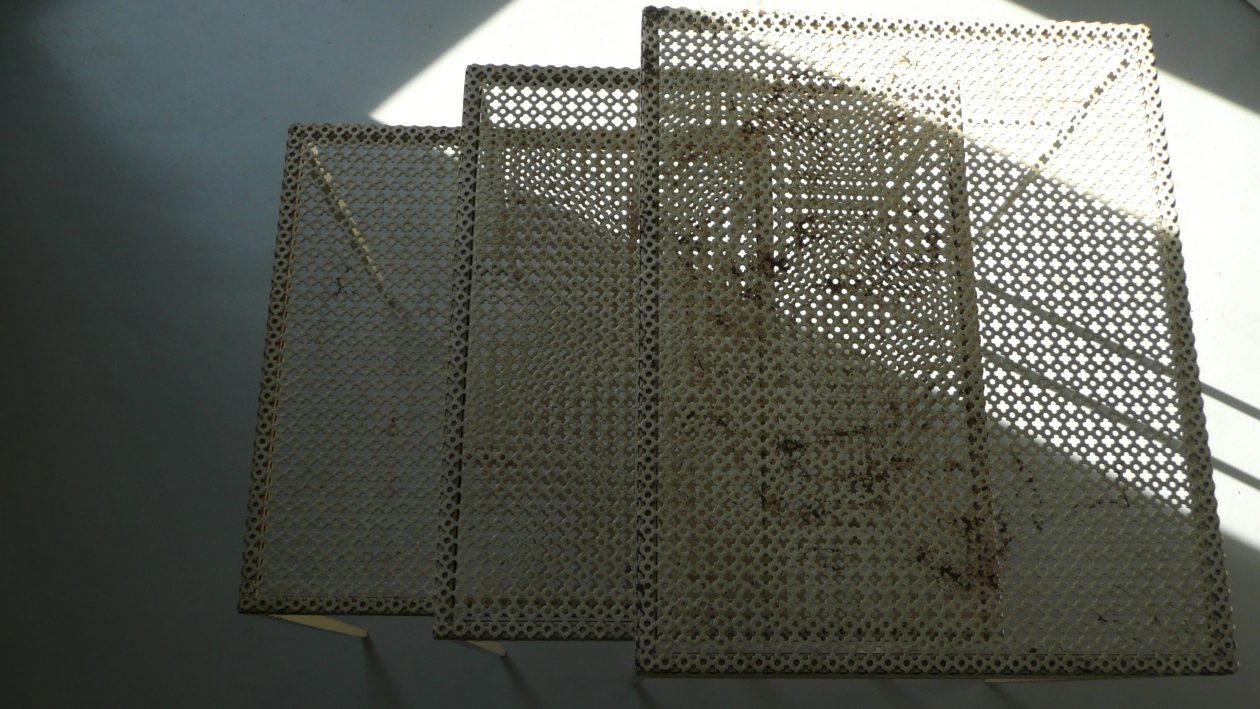 nest of table, perforated metal by mathieu mategot, 1952. Tables gigogne, métal perforé motif trèfle. Mathieu Matégot; 1952.